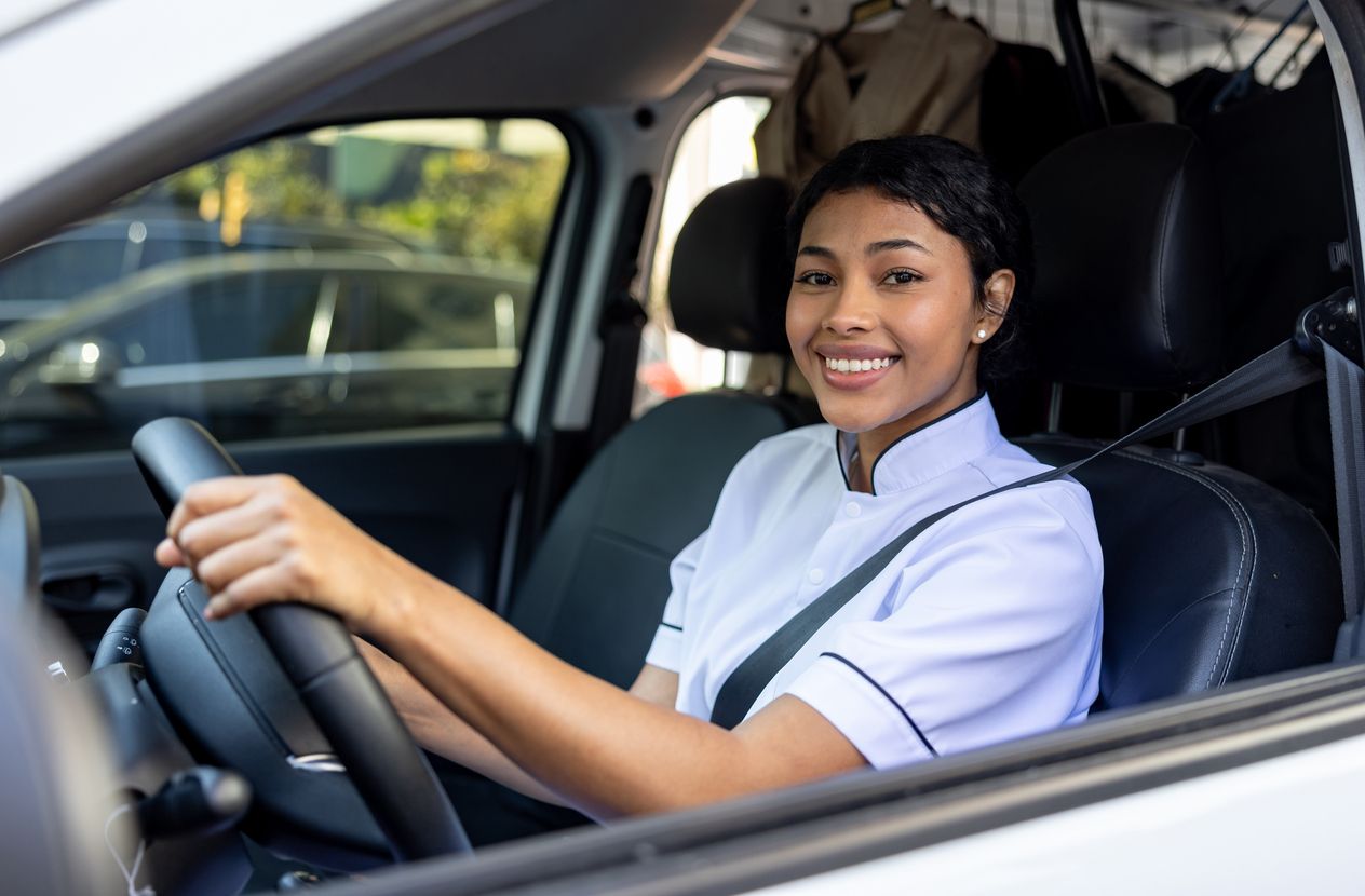 emale commuter leaving home while laundry pickup and delivery arrives in Nashville TN