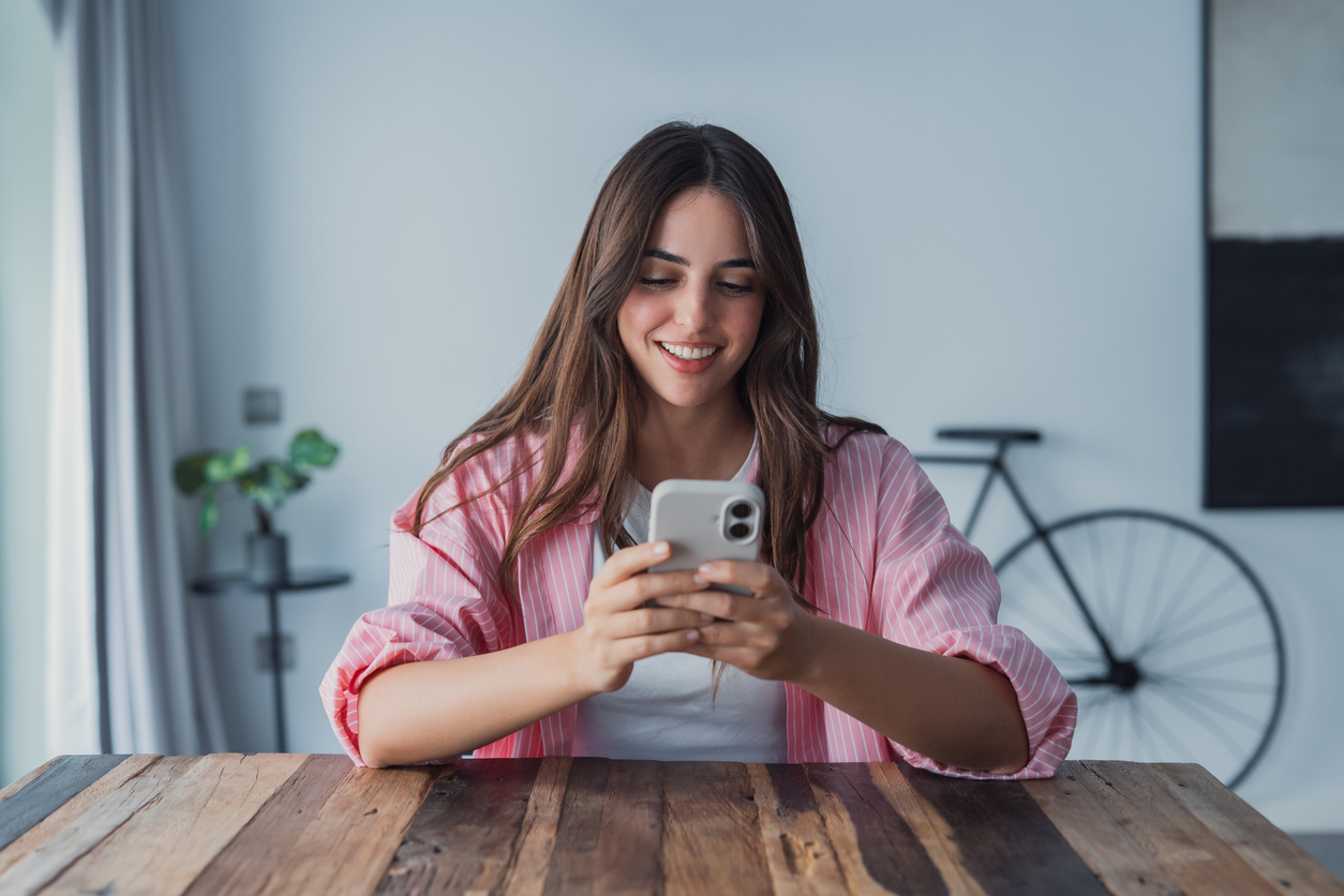 Woman Smiling at phone