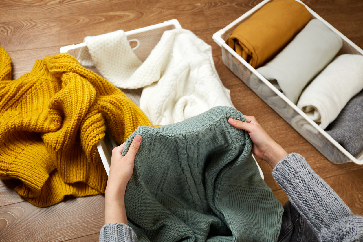 Fall sweaters being taken out of storage for the season